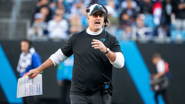 Panthers coach Frank Reich gestures during a game